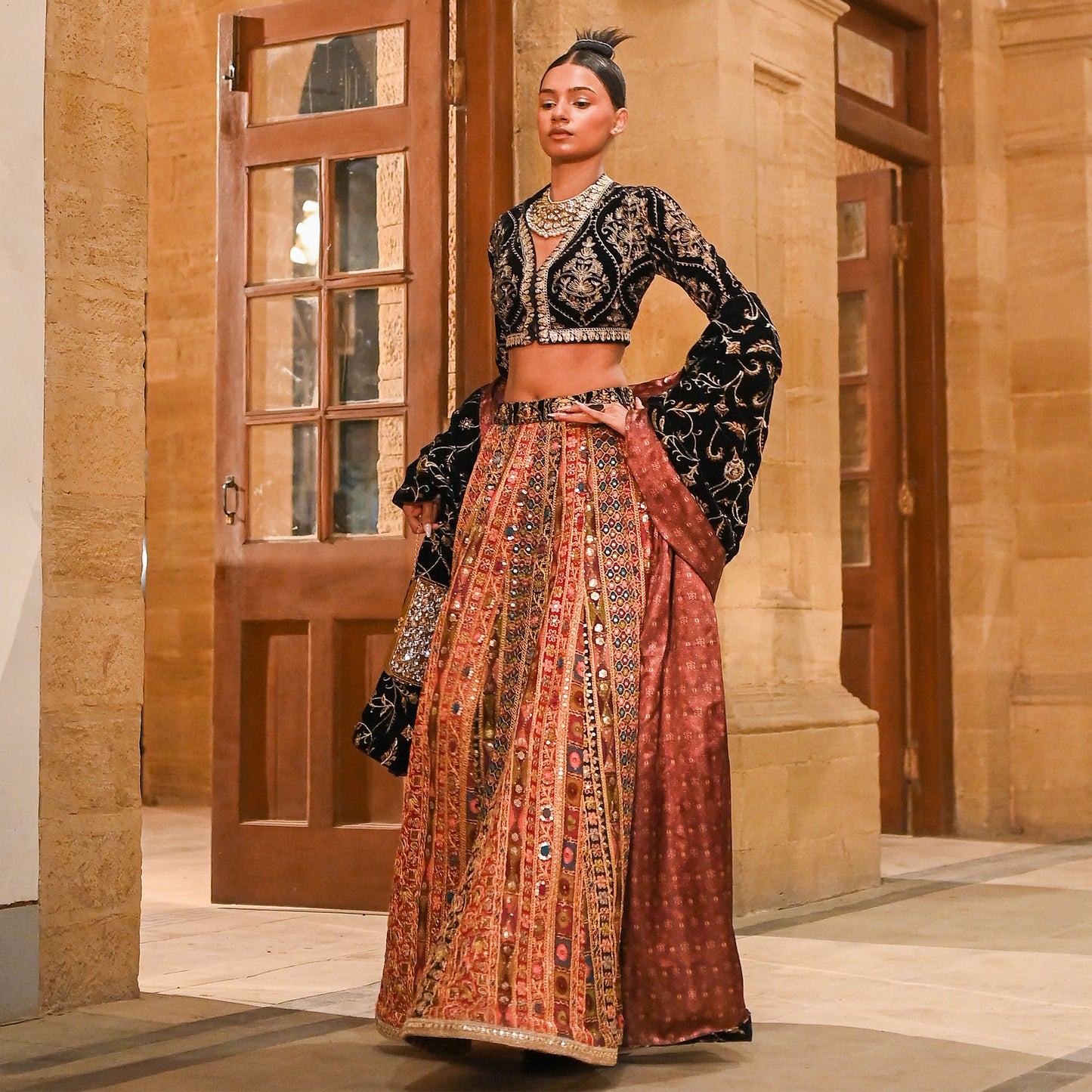Black & Gold Embroidered Crop Jacket with Multicolor Lehenga & Velvet Shawl