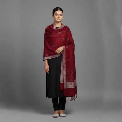 Woman wearing a red patterned Shawl 