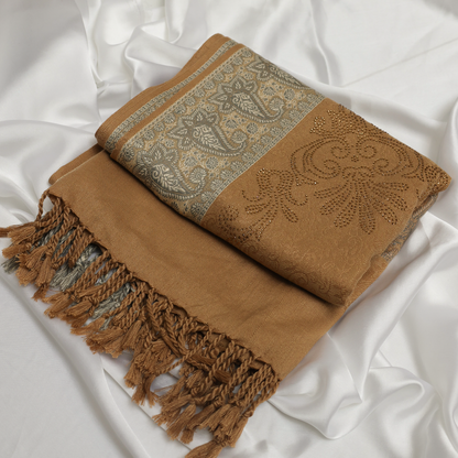 Woman wearing a Khaki and gray patterned Shawl 